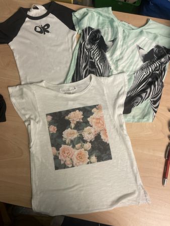 3 H&M T-Shirts Gr.134/140 mit Druck