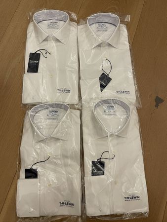 Four T.M. Lewin shirts, brand new in packaging