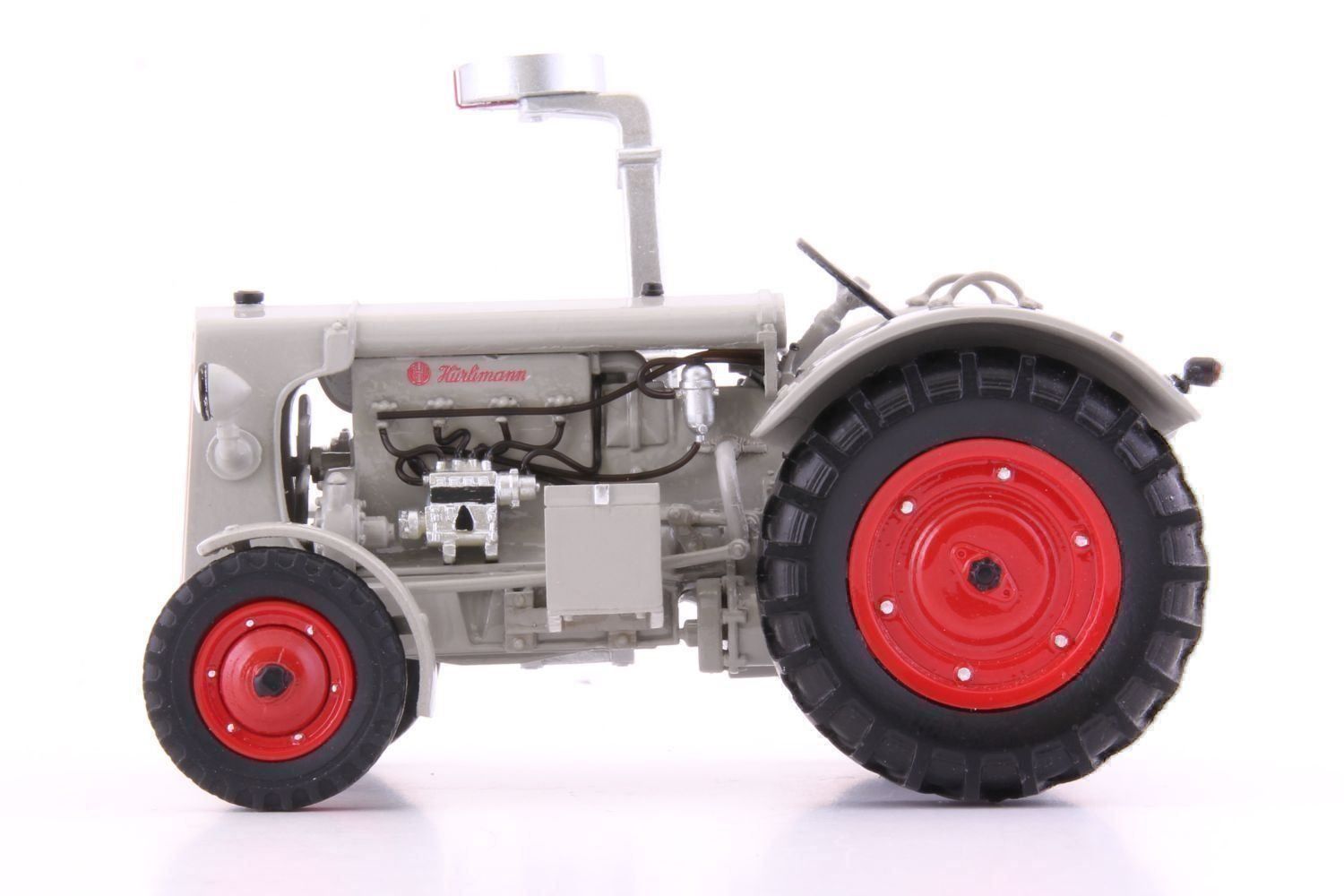 Hürlimann Modellini d'auto: HÜRLIMANN TRAKTOR D200 MIT EGGE 1:32 – Nuovo e nell'imballaggio originale da Suhr venduto da Moebelsiralfred 2