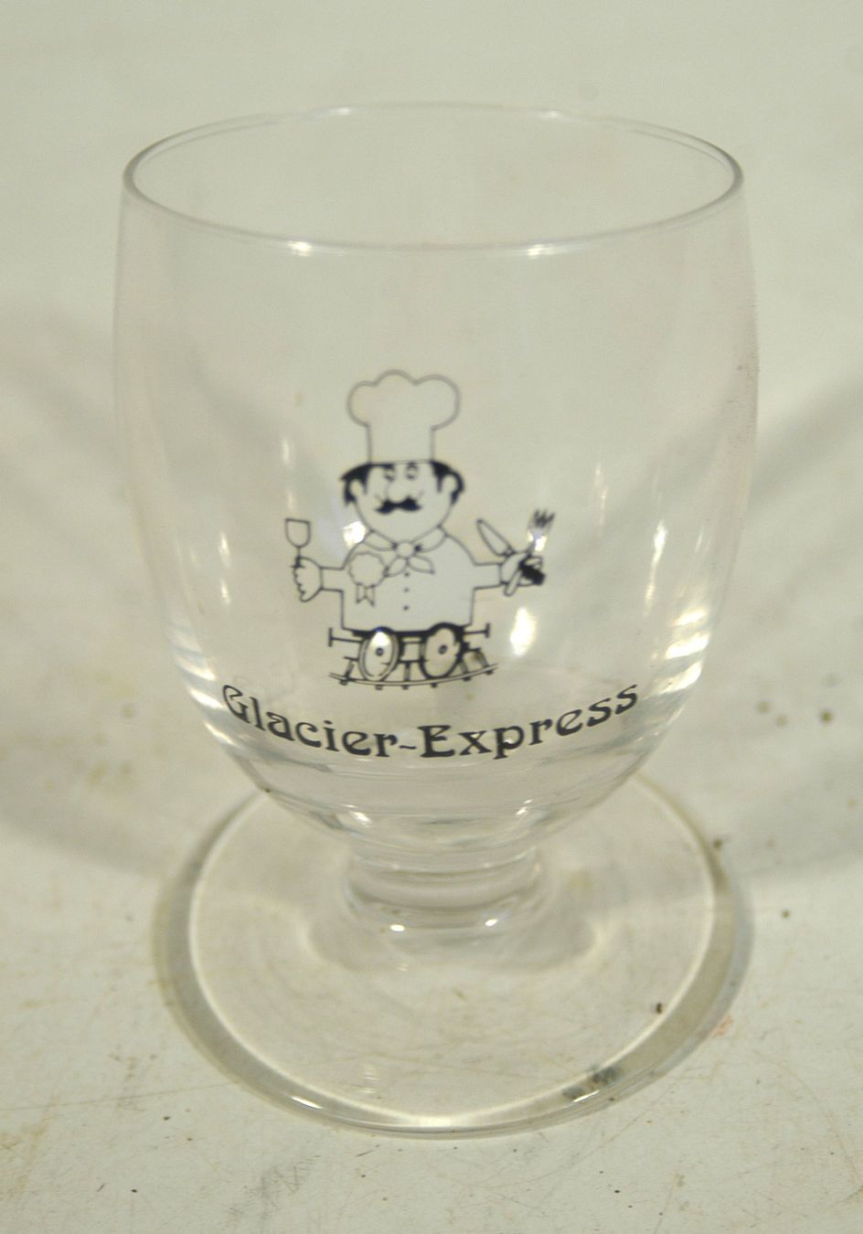 Bicchieri: Glacier Express Trinkglas mit Neigung – Usato da Herisau venduto da Wisen