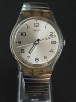 Montre Swatch Argentée Date Fonctionne pile Neuve, 34mm