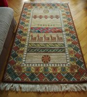 Vintage Teppich mit folkloristischen Mustern – Boho Stil