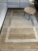 Wollteppich handgeknüpft beige 169x244 cm guter Zustand