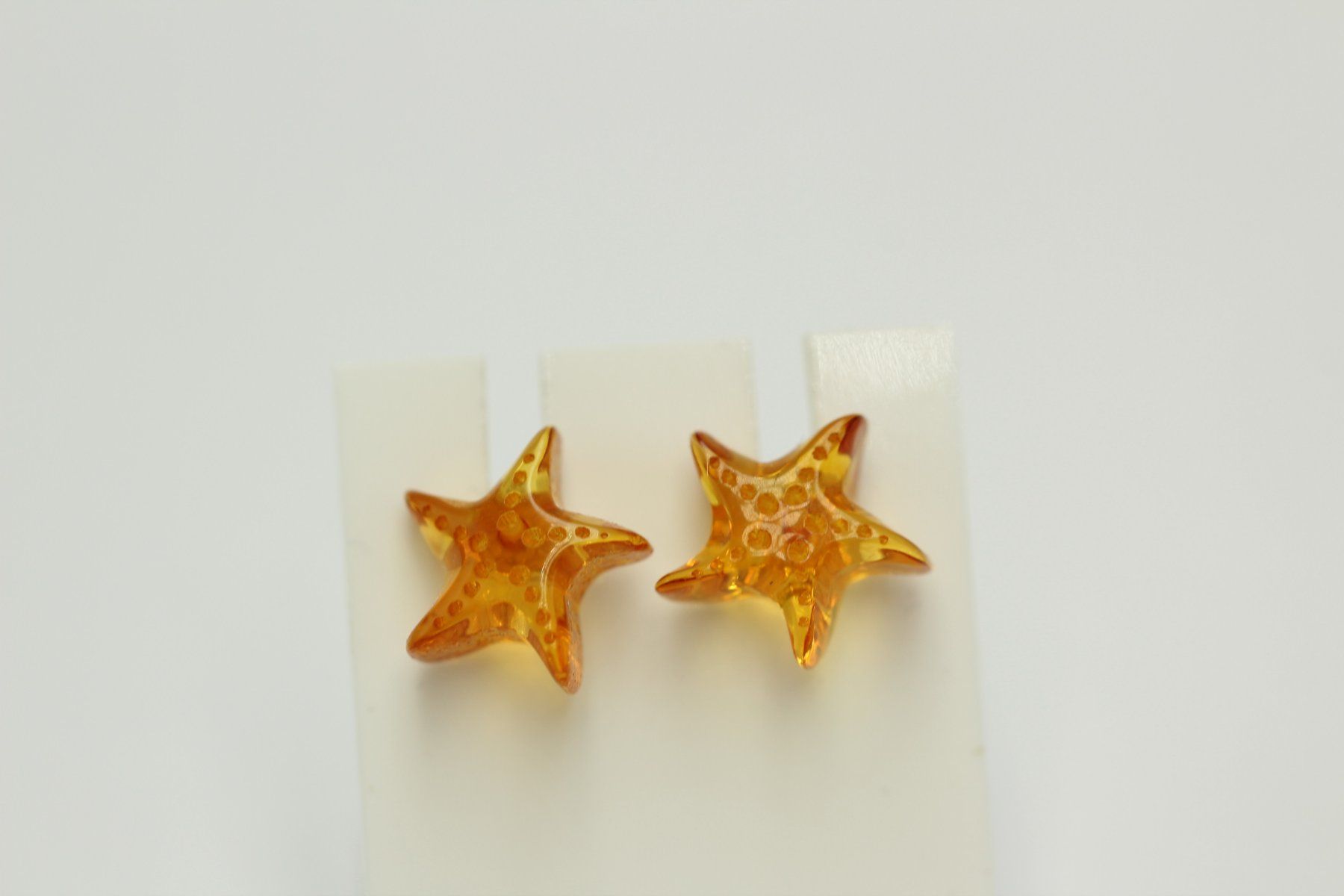 Orecchini pendenti & Orecchini a lobo: Bernstein Seestern 925 Silber Ohrstecker Seesternohrring Ber – Nuovo e nell'imballaggio originale da Heiligkreuzsteinach venduto da schmucktime 7