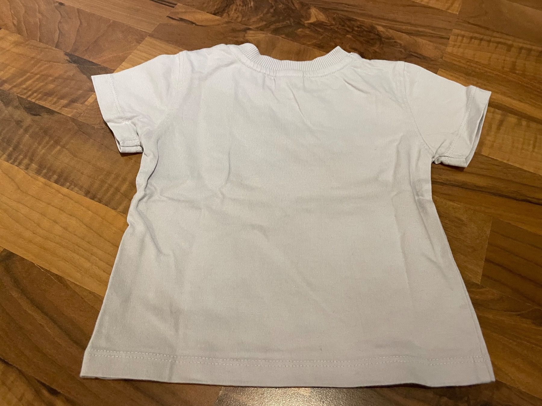 Hemden, Tops & T-Shirts: T-Shirt von Smile Grösse 68 – Gebraucht aus Goldswil von Fisel 2