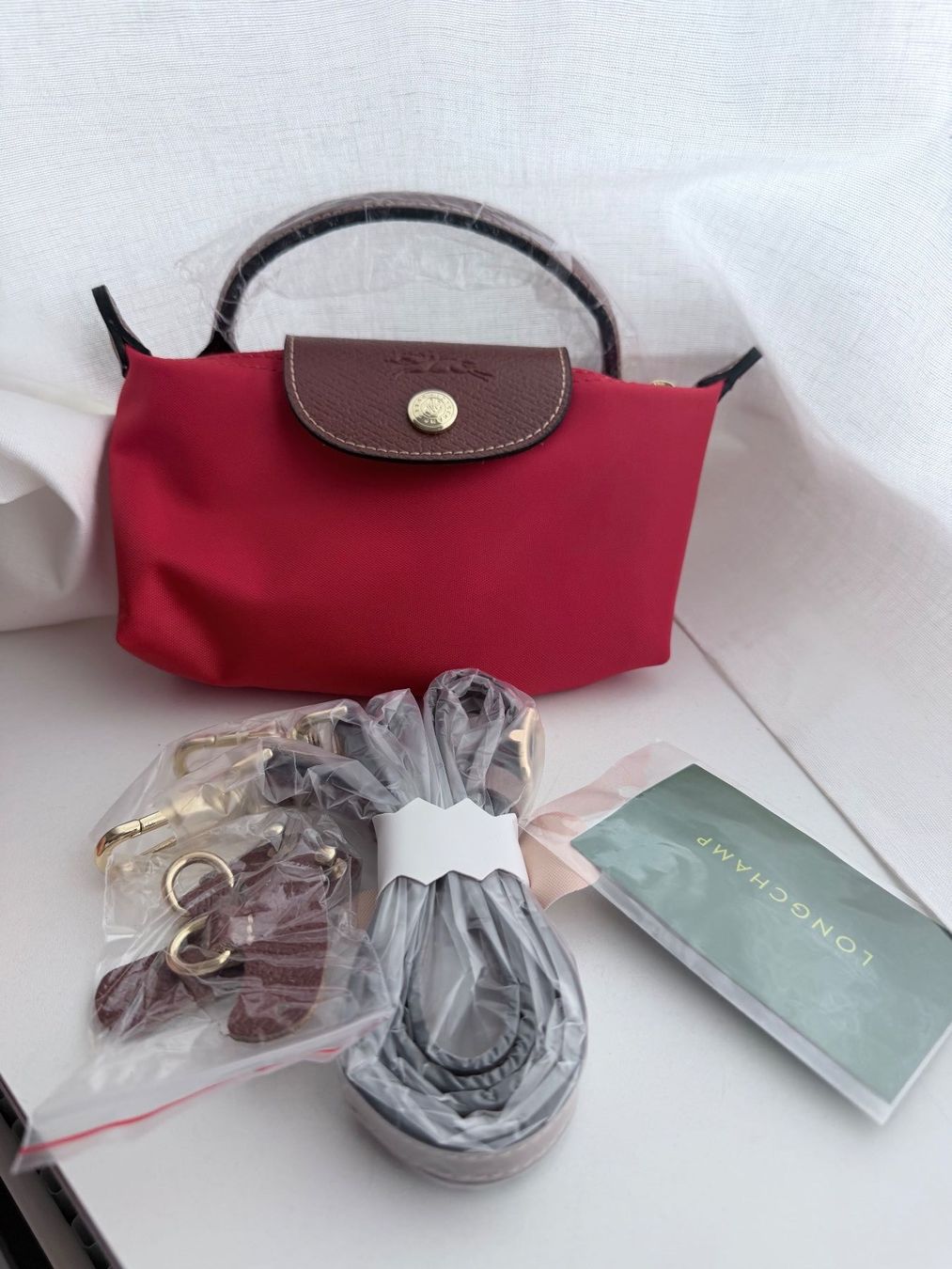 Longchamp Borse: Longchamp Le Pliage Mini rot – Nuovo (secondo la descrizione) da Hochdorf venduto da flohmarktfee 1