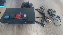Playstation 2 avec 4 carte mémoire et 1 manette