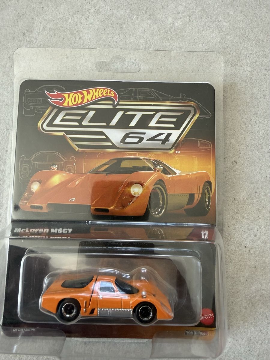 Hot Wheels Modellini d'auto: Hot Wheels - Elite 64 McLaren M6GT  – Nuovo e nell'imballaggio originale da Yvorne venduto da AutoCollectionneur