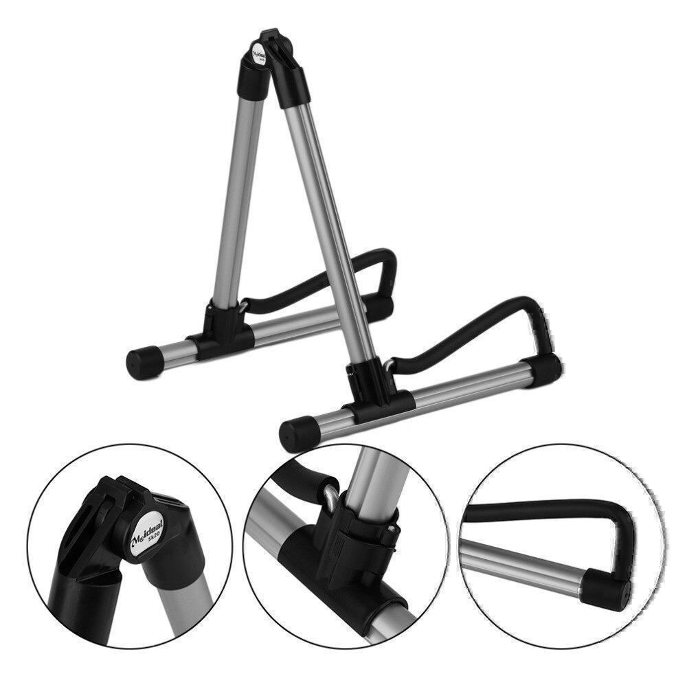 Supporti per strumenti musicali & leggii: Support de guitare pratique en argent – Nuovo e nell'imballaggio originale da Gurmels venduto da Swisspod 1