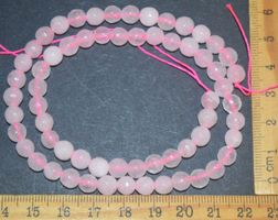 Stein Perlen F-932 – Rosa Quarz facettiert– 5-6mm - 63 Stück