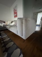Ecksofa grau mit Holzfüssen in gebrauchtem Zustand