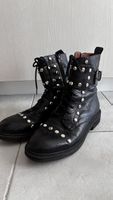 Black studded leather boots