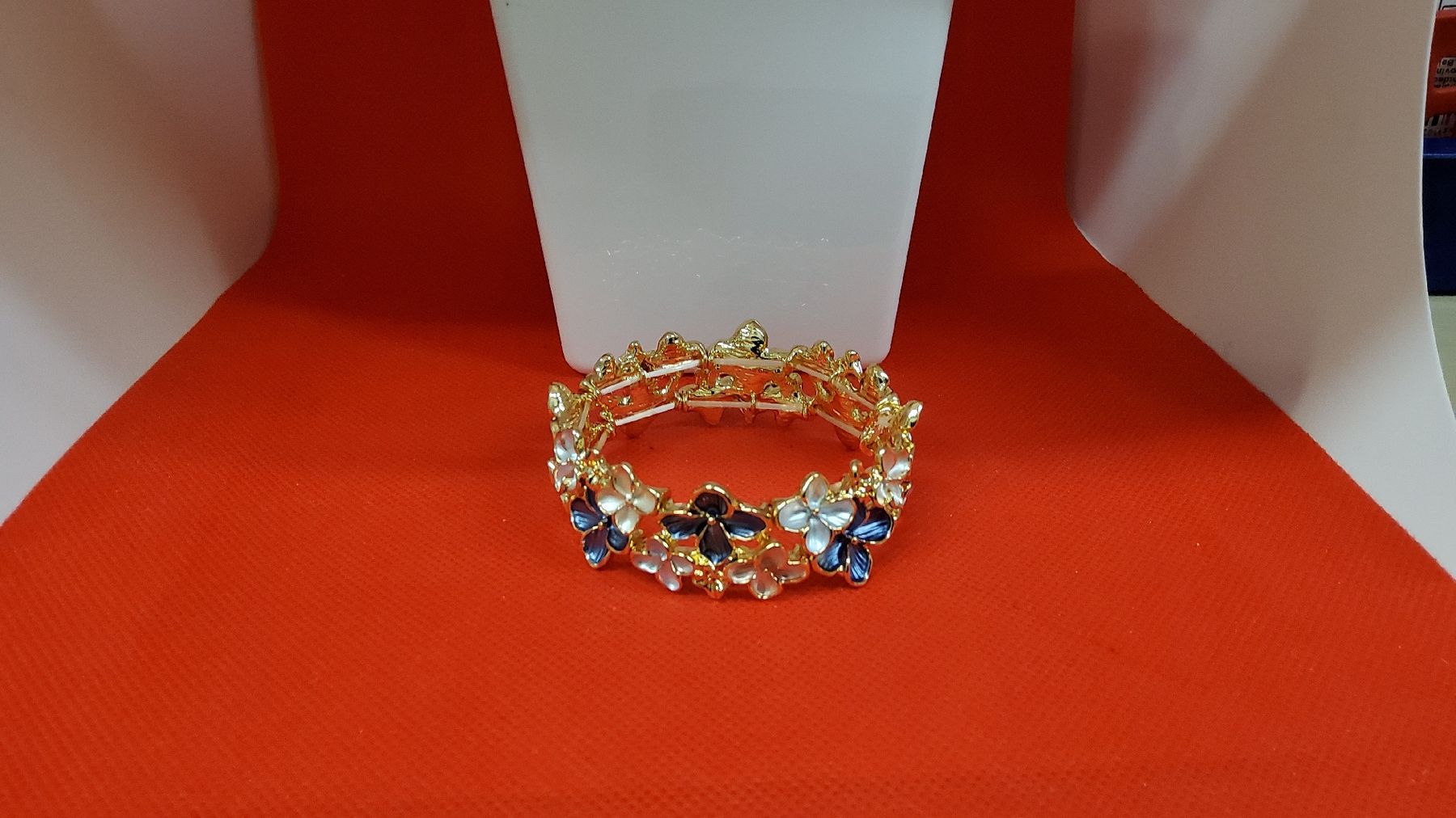 Bracciali & Braccialetti: Schönes Blumen Armband Goldfarben mit Emaille – Nuovo e nell'imballaggio originale da Herisau venduto da Nluanalucas 2
