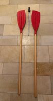 2x Red paddles wooden shaft good condition