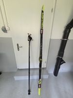 Fischer Langlaufski Twin Skin Pro mit Swix Stöcken