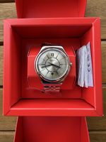 Montre Swatch métallique et bracelet métallique