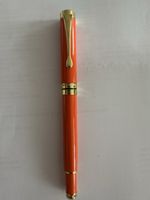 Orange Metall Rollerball mit Goldakzenten