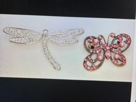 2 broches papillon avec pierres roses et argenté