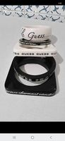 Bellissimo set 5 bracciali rigidi Guess con frasi diverse