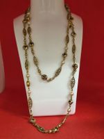 Lange Kette Goldfarben mit Perlen und Ornamenten