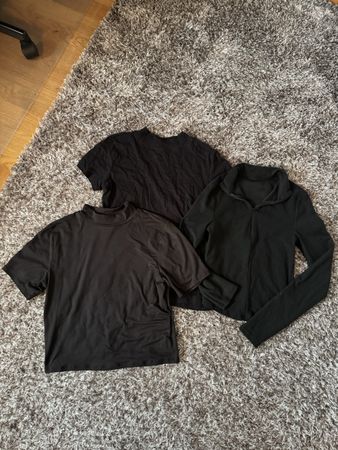schwarze Oberteile für Frauen