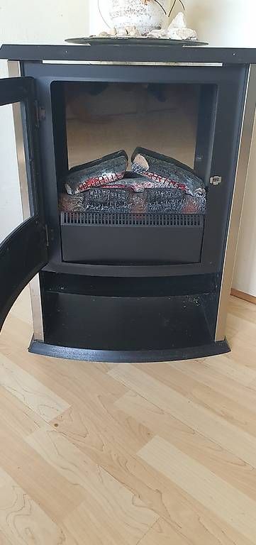 Radiateurs: Heizung mit künstlichen Feuer  – D'occasion à Mastrils par Sun10 1