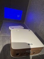 LG Pocket Beamer PH150G mit Fernbedienung