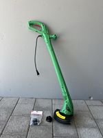 Trimmer mit Garantie und Zubehör 