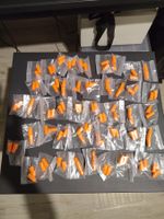 Lot of ~45-47 pairs of foam earplugs (noise reduction)