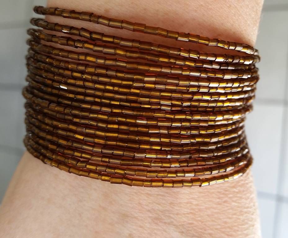 Bracelets: Armreif, Farbe Gold-Braun – D'occasion à Soyhieres par chatons 1