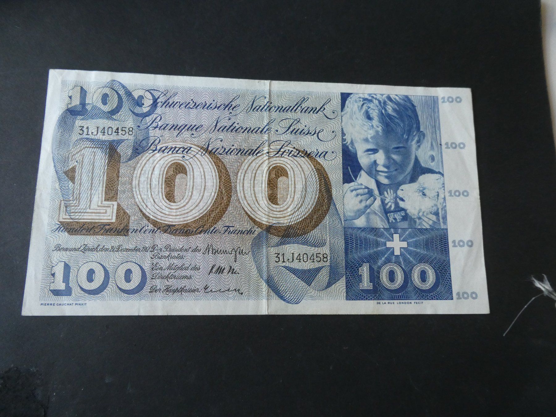 Banknoten: Schweiz 1961,  100 Franken – Gebraucht aus Hinterforst von Rohusri
