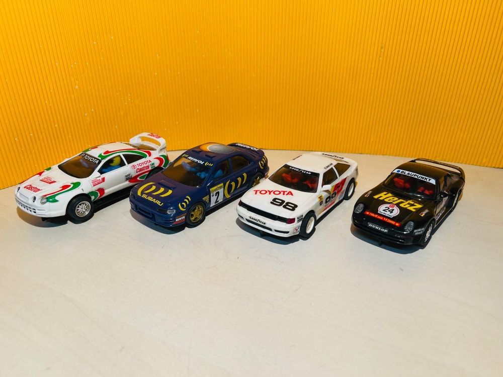 4 Slotcars von SCX - 2 x Toyota Celica, Subaru und Porsche | Acheter ...