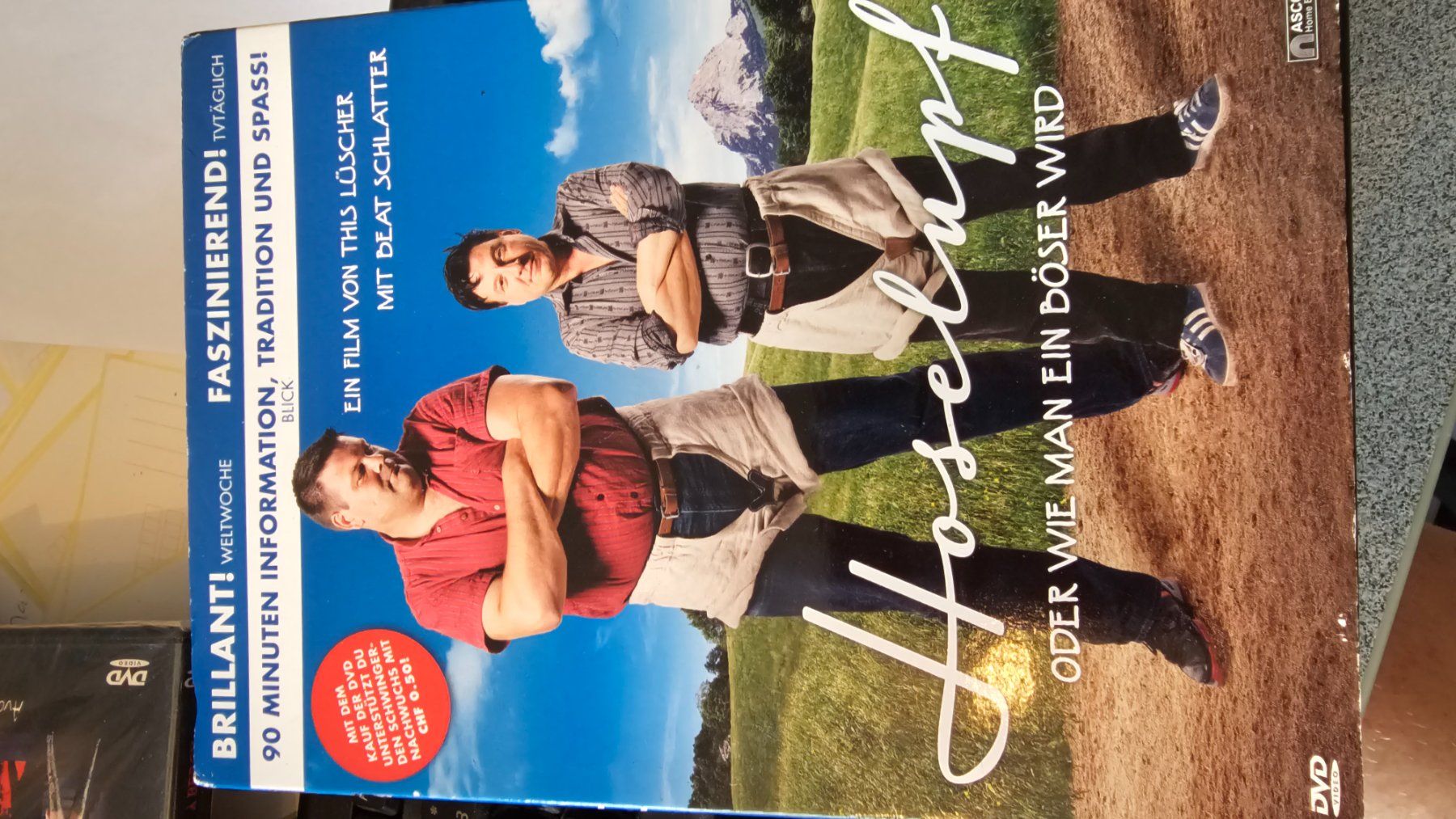 Tutti i DVDs: Hosenlupf-oder wie man ein böser wird/Beat schlatter/dvd/neu – Nuovo e nell'imballaggio originale da Bremgarten AG venduto da musiccollector