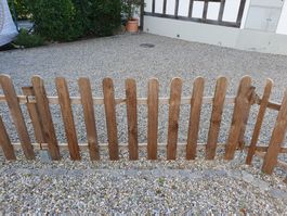 Holzzaun mit Türe