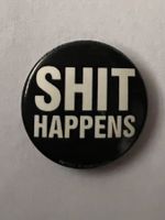 Button «SHIT HAPPENS»
