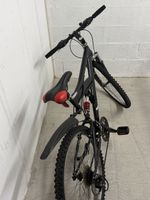 VTT tout suspendu noir et rouge 