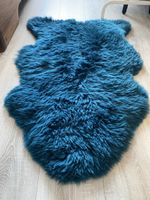 Tapis en peau de mouton bleu pétrole - Chaud & Doux!