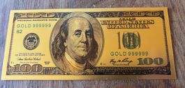 1 goldfarbene 100 Dollar Note für CHF 1.— (Spass-Geldnote)