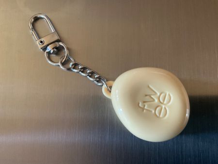 Schlüsselanhänger mit Spiegel gelb oval & kl. Fach für Creme