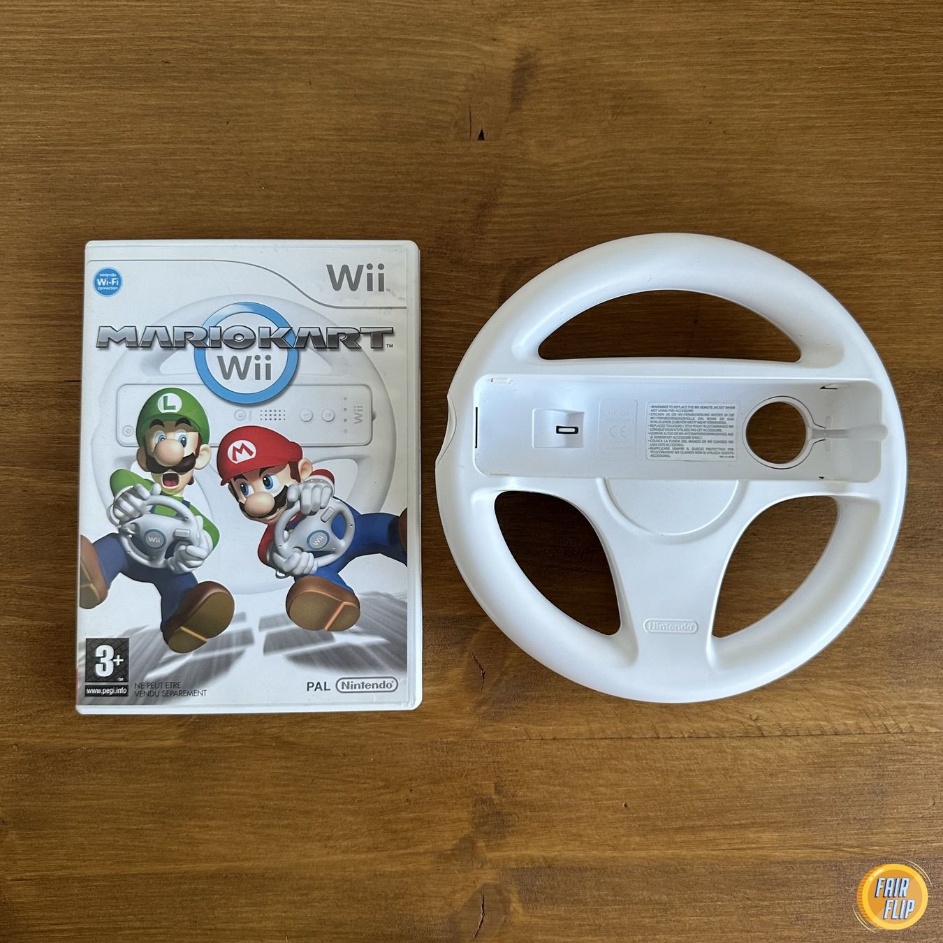 Jeux: Wii Mario Kart mit Lenkrad – D'occasion à Luzern par fairflip