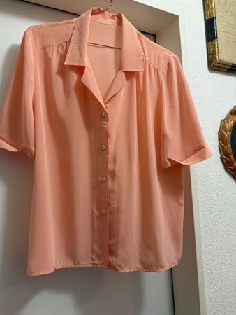 Luftige elegante orange Damenbluse für den Sommer