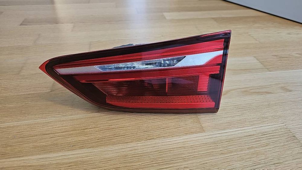 Olsa 63212990113, 10413900 Tail Light; Left Inner - BMW