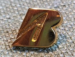 E711 - 3D Pin Gldiges Bridgestone B Logo