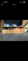 Meuble TV en bois avec trois tiroirs bon état