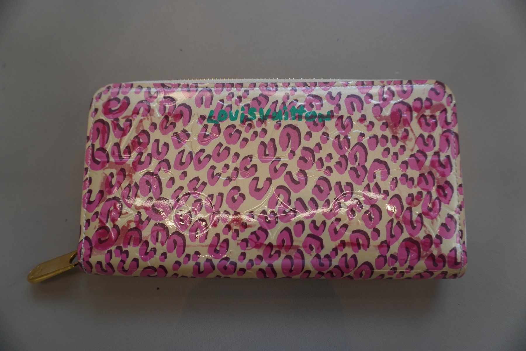 Louis Vuitton Portamonete: Louis Vuitton "Zippy Leopard" – Usato da Genève venduto da Harold-W