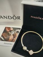 Jonc argenté Pandora Coeur de l'Hiver et charm Pandora rose
