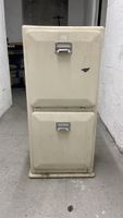 Vintage cabinet with two doors, beige, visible wear
