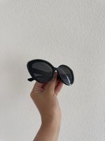 Prada Sonnenbrille schwarz Marmor-Print