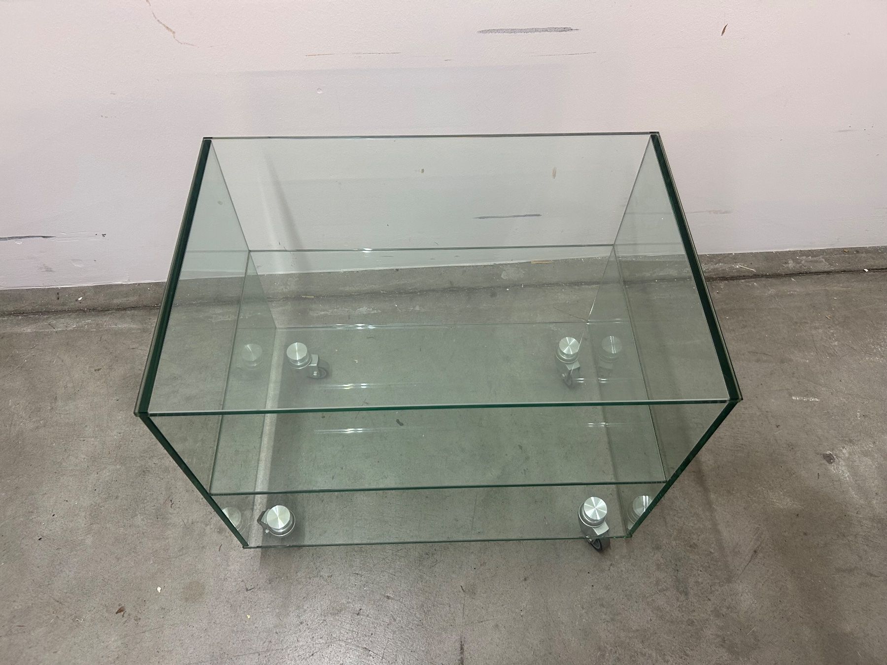 Mobili TV: TV-Möbel aus Glas mit einem Tablar auf Rollen – Usato da Zürich venduto da Levelart 5