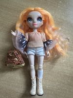 Rainbow High Poppy orange mit Kleidung und Rucksack 